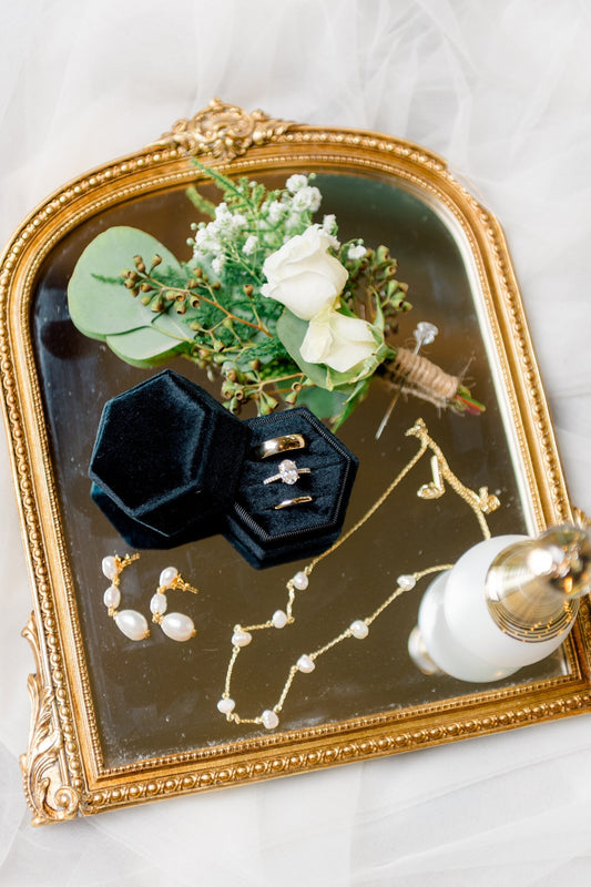 photo of wedding rings and details by lindsey ott photography