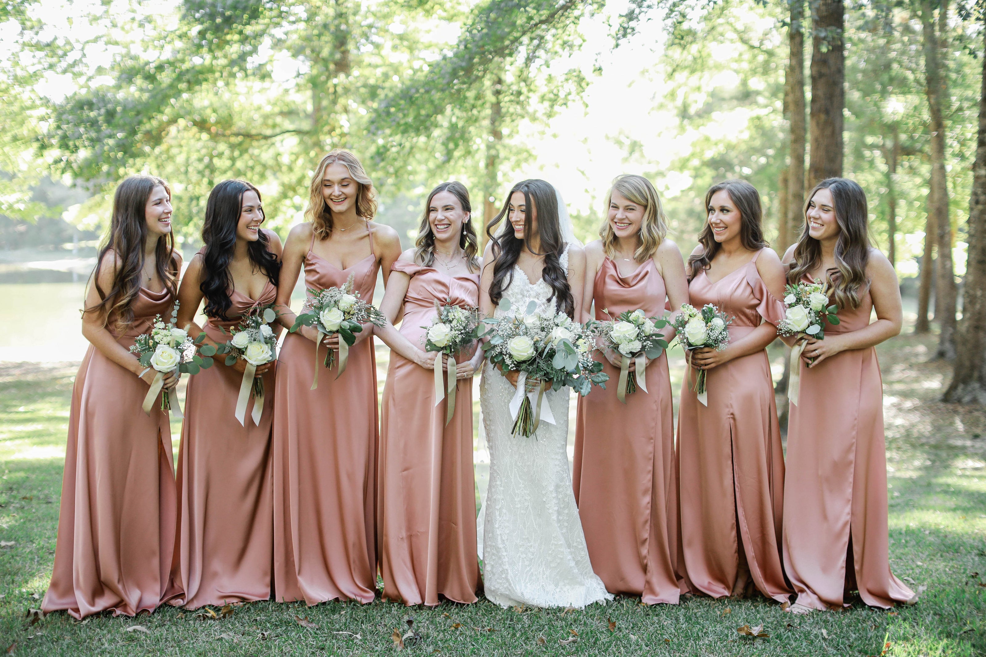 Bridal party in matching dresses at Brookwood Venue in North Mississippi