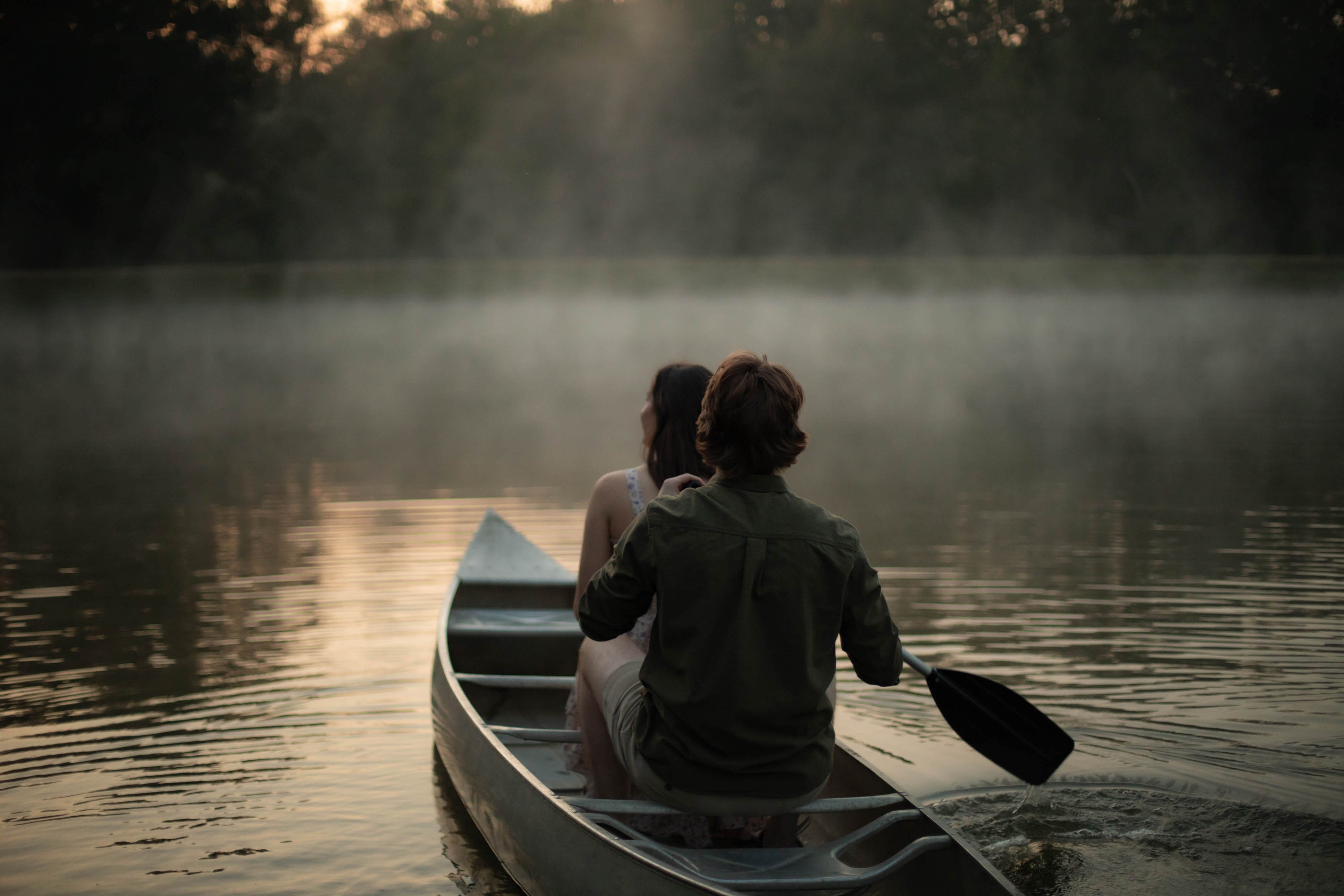 Engagement photos at Brookwood Venue with lake backdrop near Oxford, Mississippi