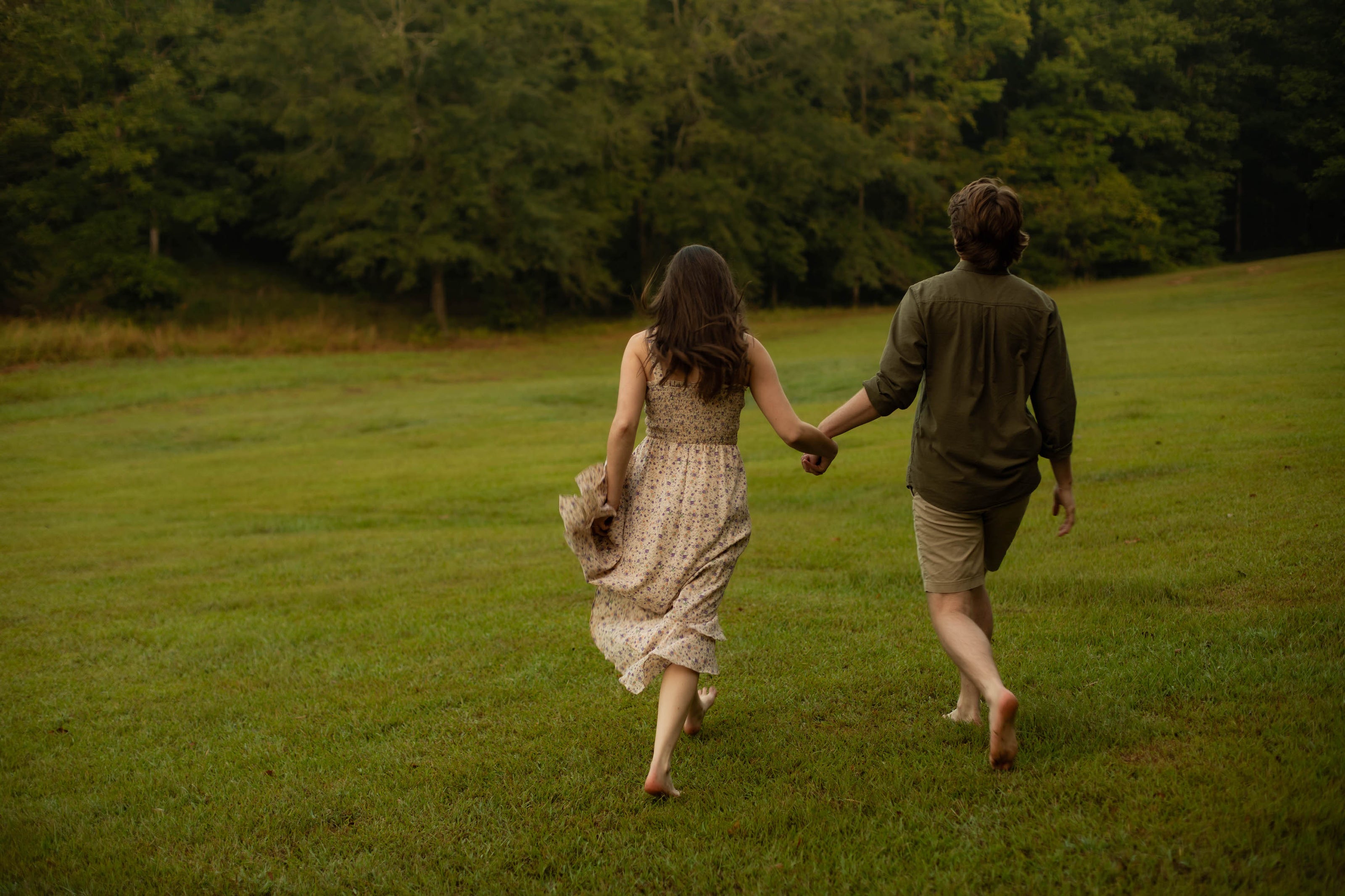 Romantic lakeside engagement photos at Brookwood Venue in North Mississippi.
