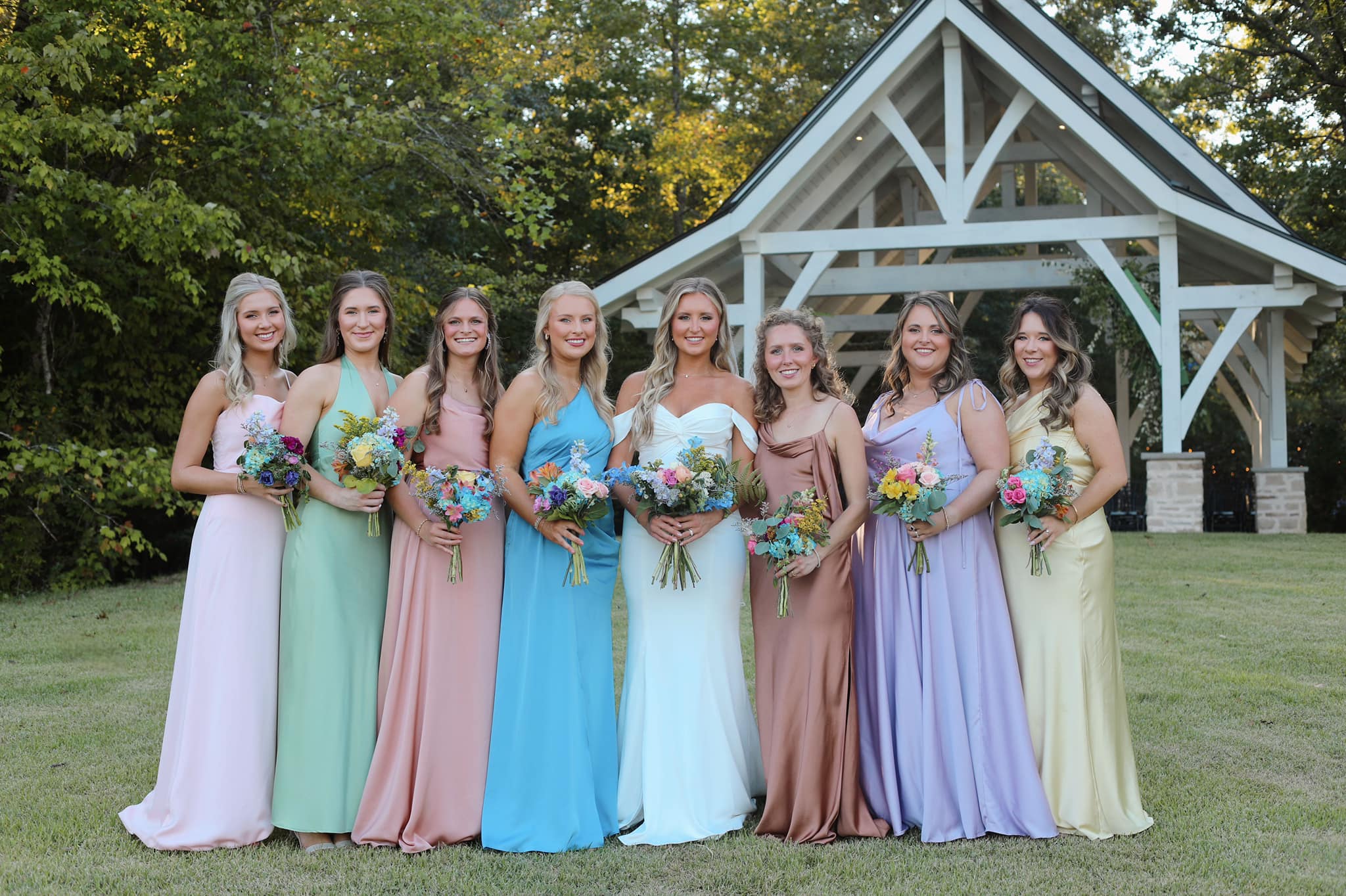 Playful bridal party moment at Brookwood Venue in North Mississippi