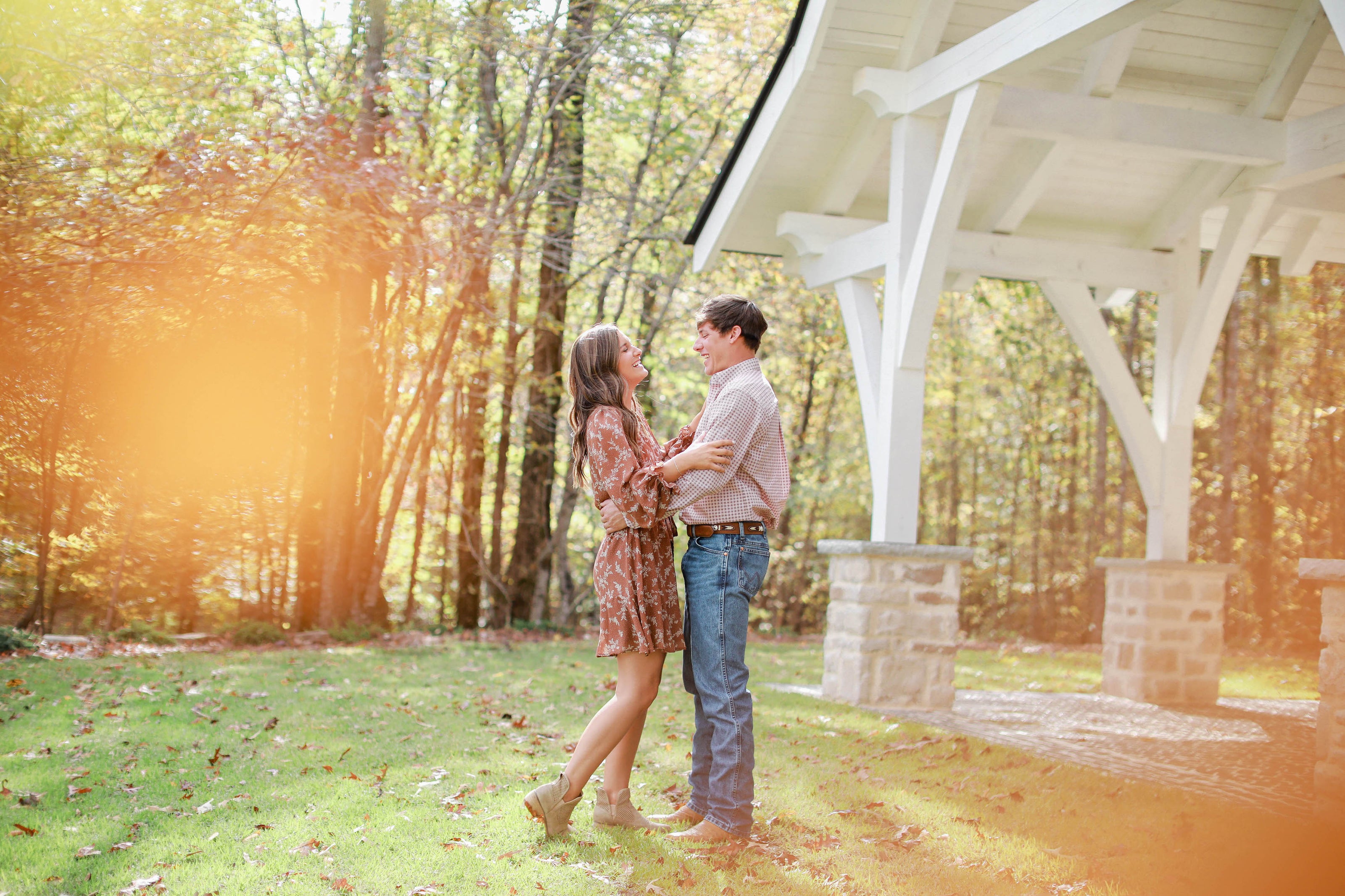 Golden hour engagement portraits at Brookwood Venue near Oxford, MS.