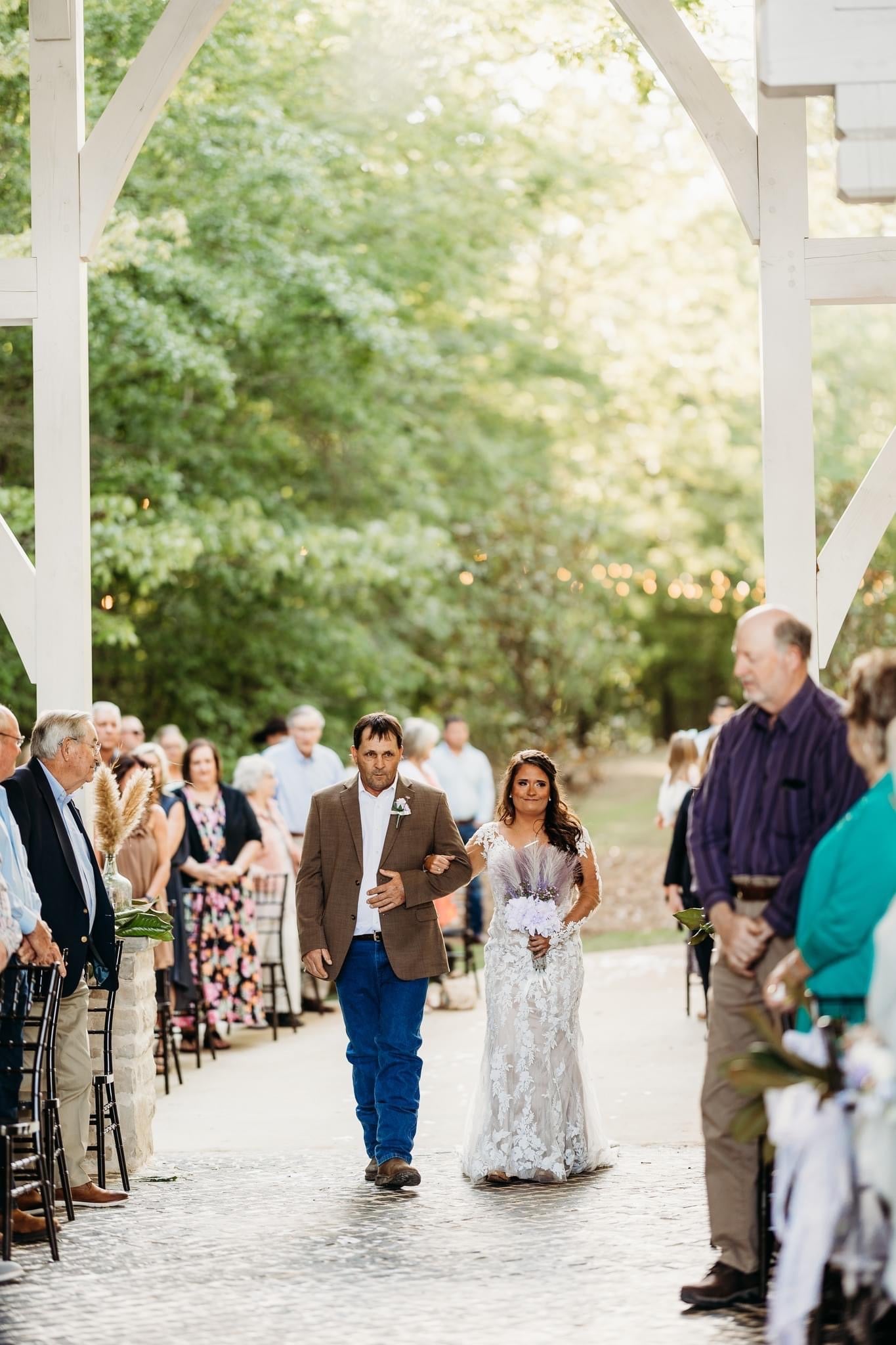 Father walking bride down aisle at Brookwood Venue chapel