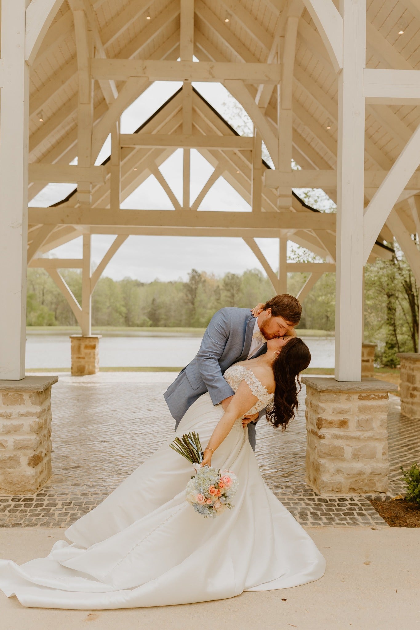 Golden hour wedding portraits at Brookwood Venue in Mississippi countryside.