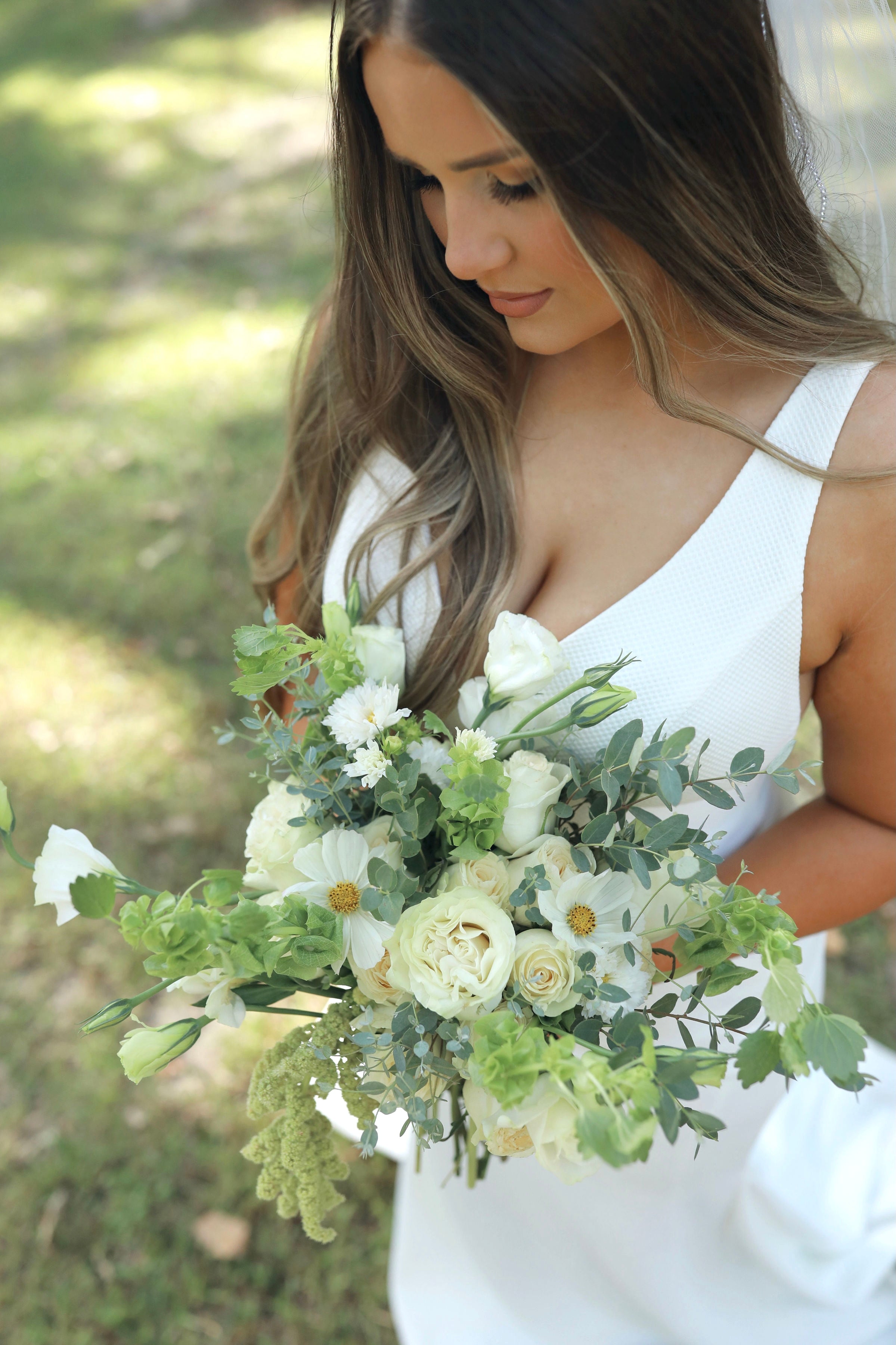 Solo bridal portrait in field at Brookwood Venue near Oxford, Mississippi.