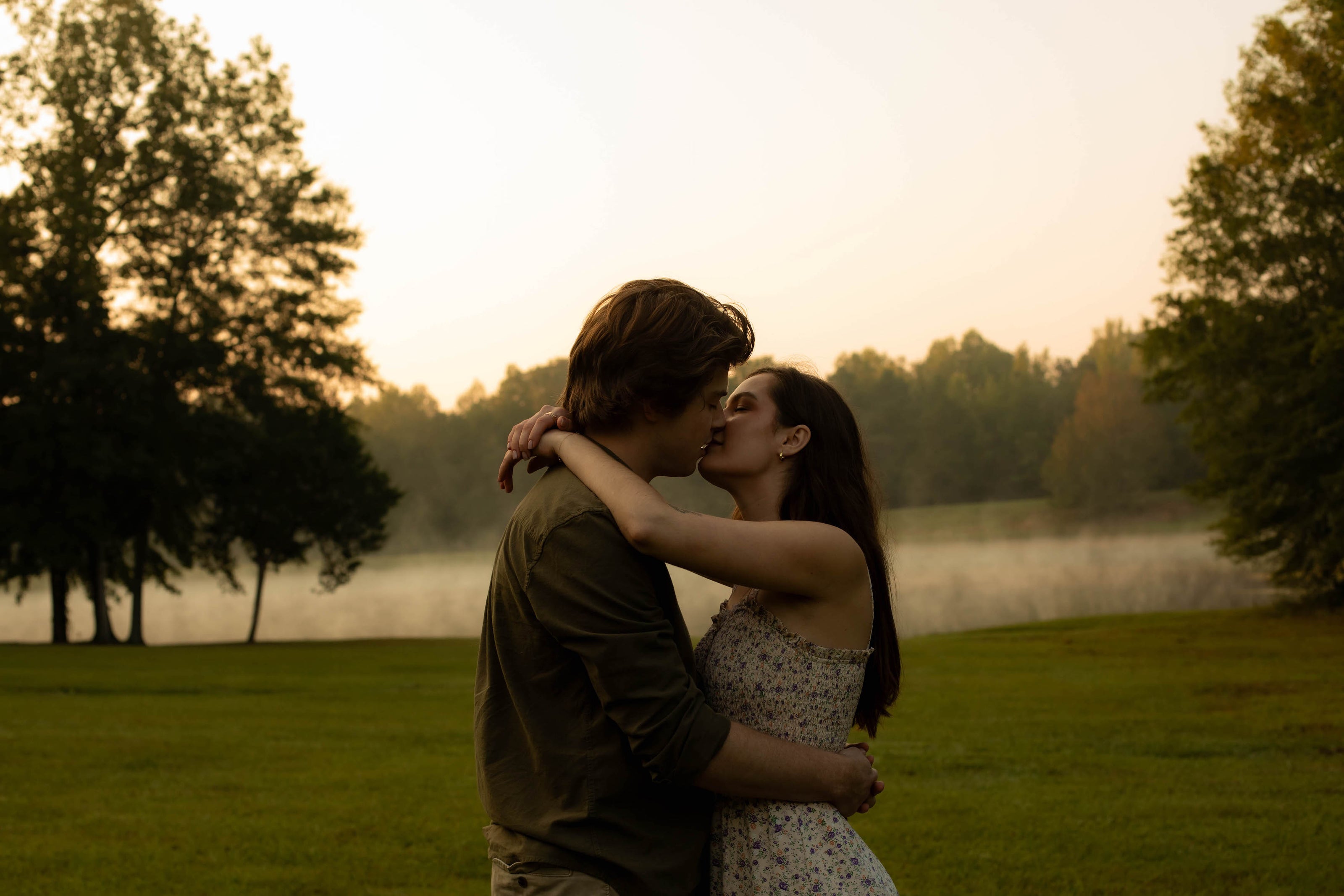 bride and groom taking photos at a rustic wedding venue in Bruce, MS