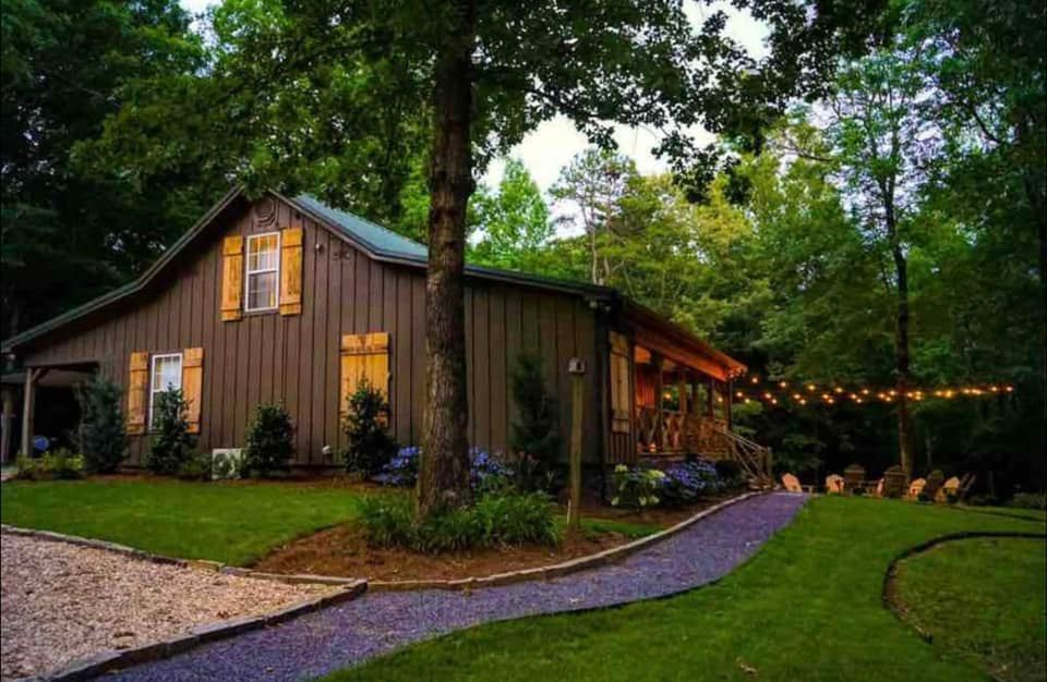 Sunset over pastoral fields surrounding family and pet-friendly Airbnb near Oxford, Mississippi