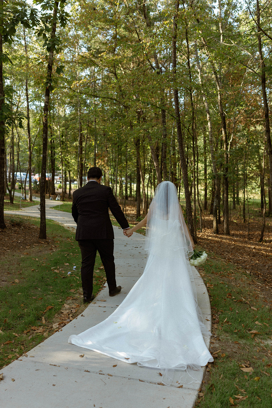 bride and groom holding hands after southern wedding ceremony in mississippi