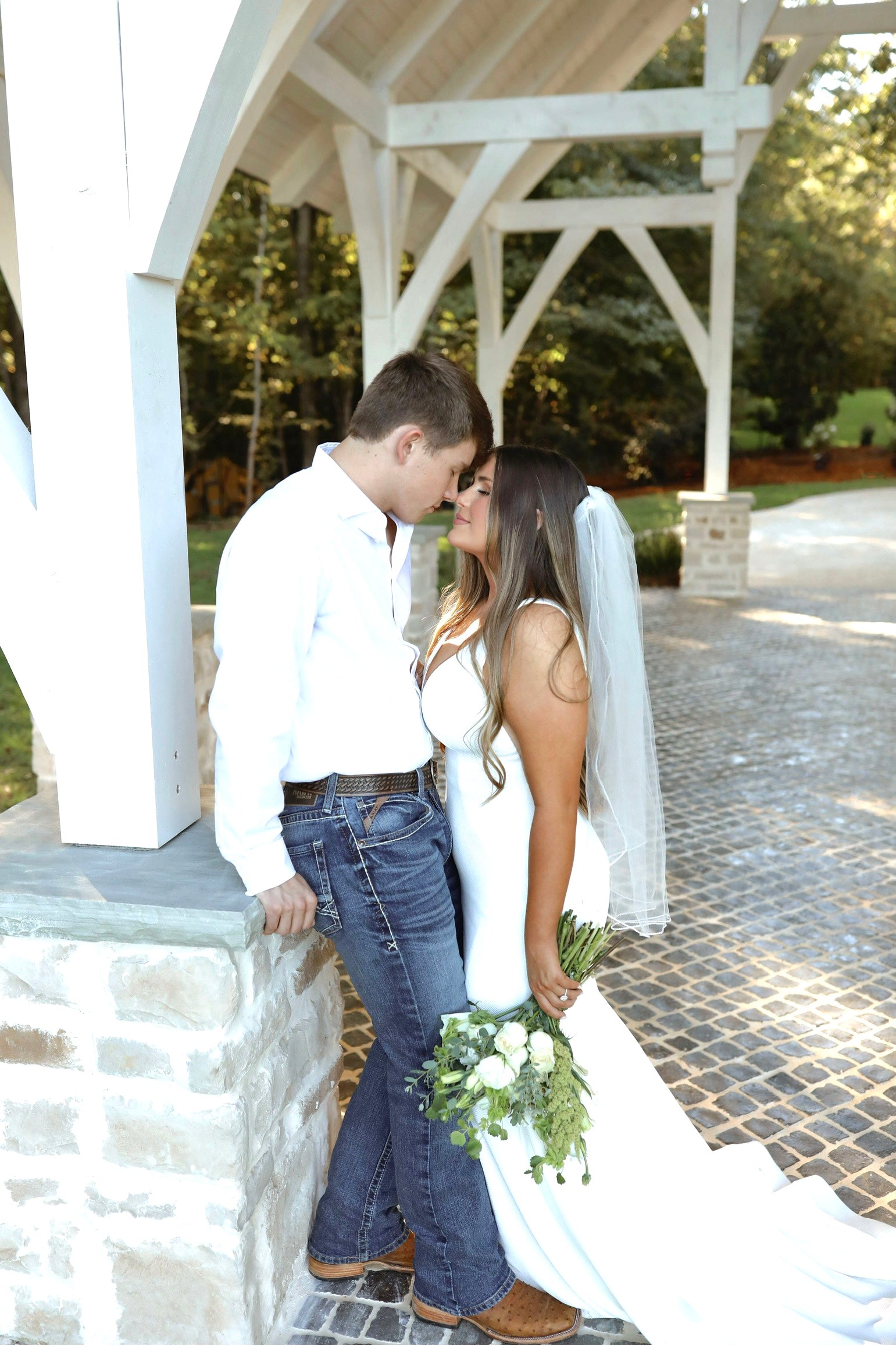 classic wedding photography under white chapel near tupelo, mississippi