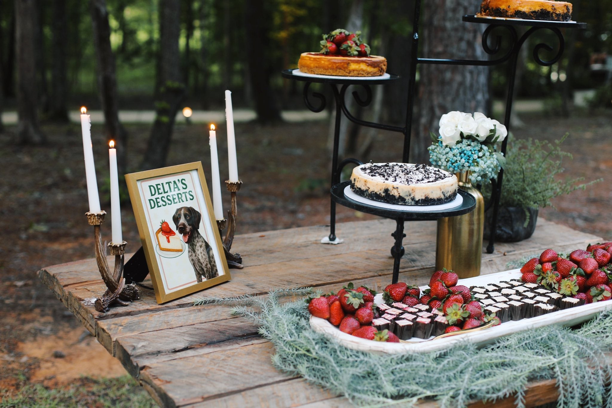 Elegant wedding catering on reception tables with desserts at Brookwood Venue in North Mississippi.