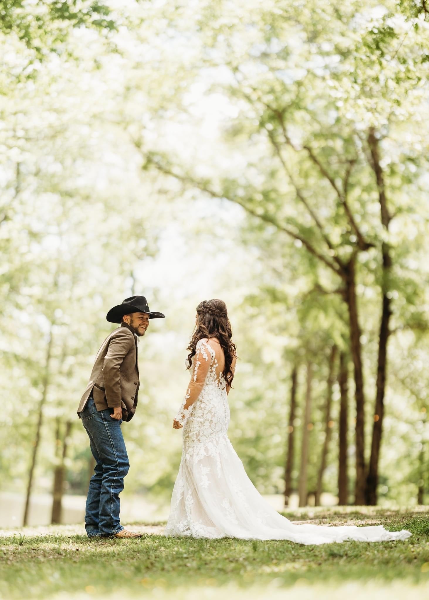 bride and groom first look at Brookwood Venue in North Mississippi.