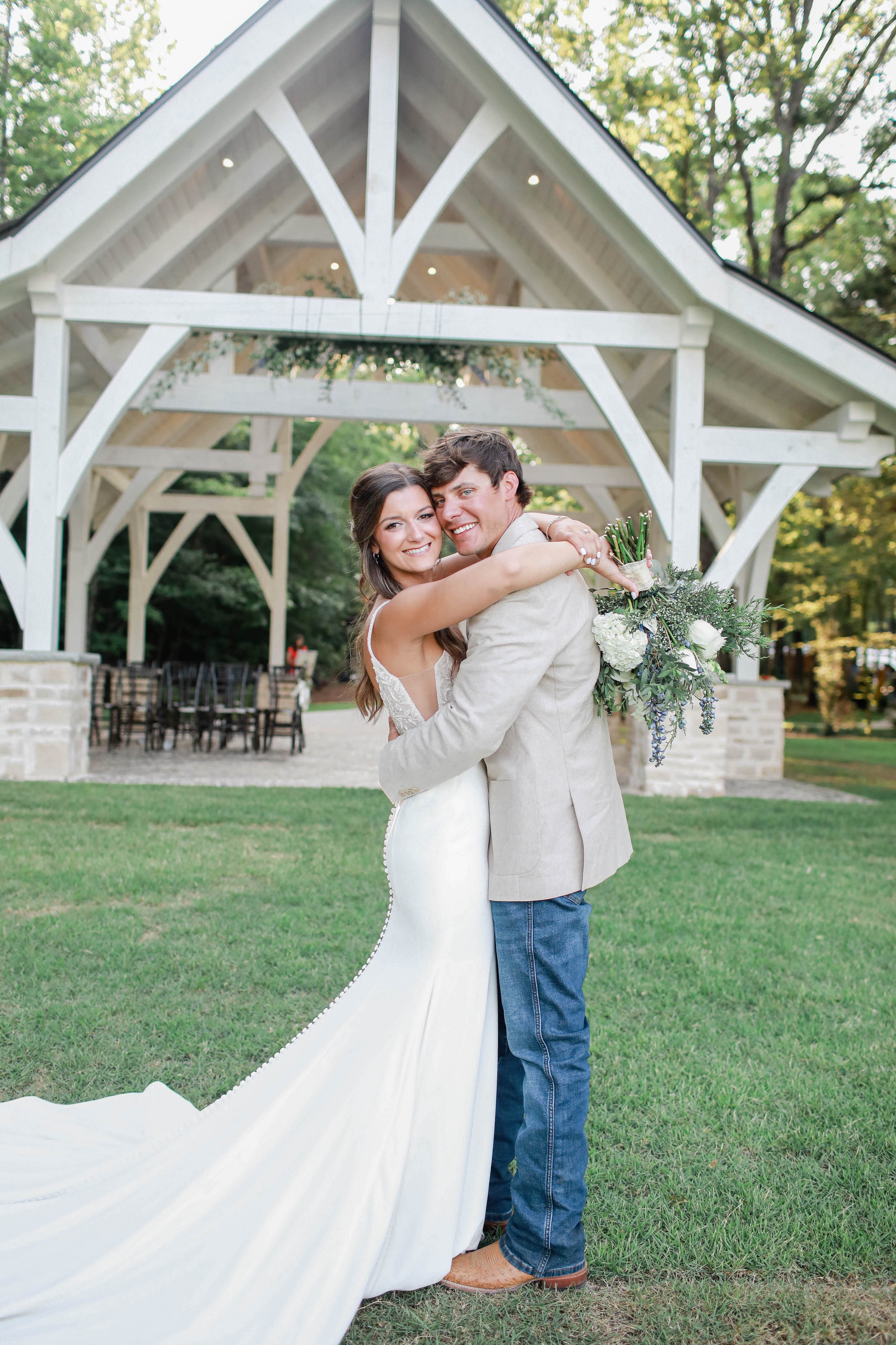 Romantic wedding portrait under trees at Brookwood Venue near Oxford, MS